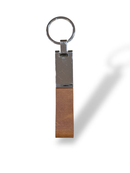 Llavero de cuero y metal color suela salvaje